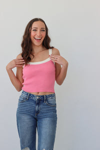 girl wearing pink ribbed tank top with white contrast