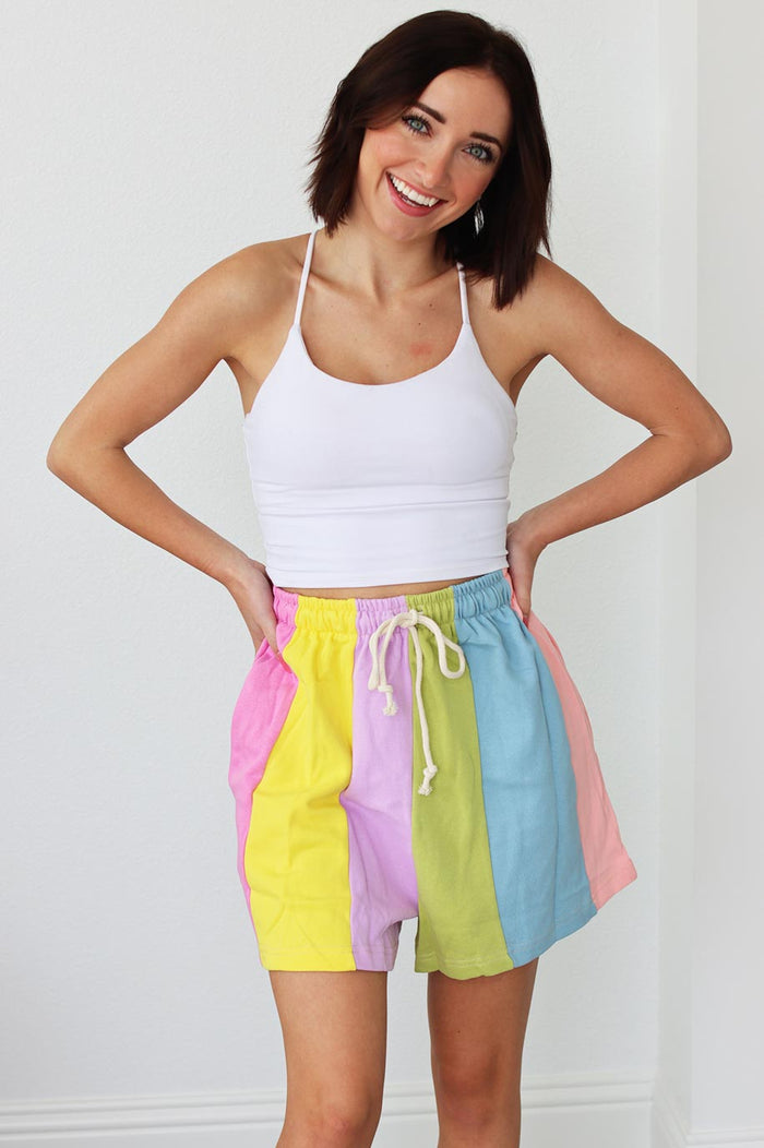 girl wearing multicolored drawstring shorts