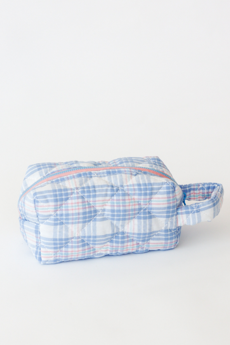 Blue and white checkered pouch on a white background