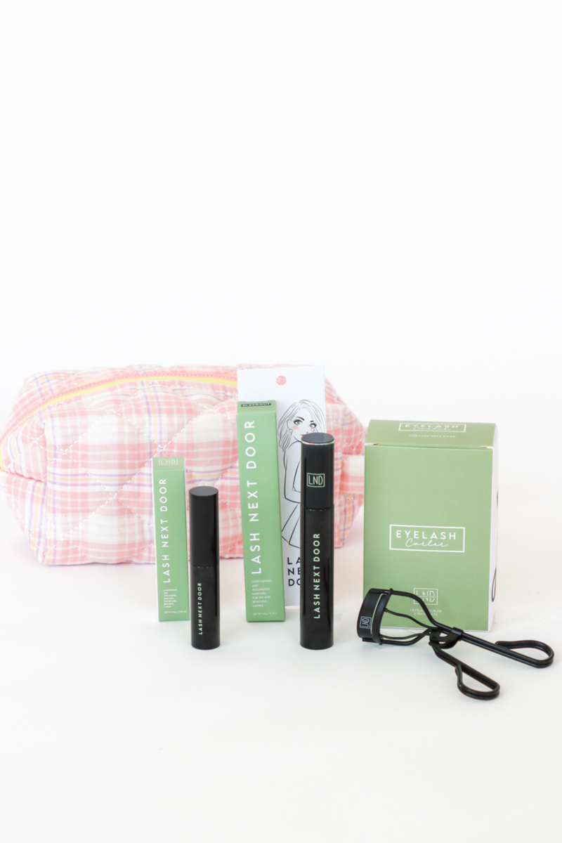 Eyelash extensions with packaging and a pouch on a white background