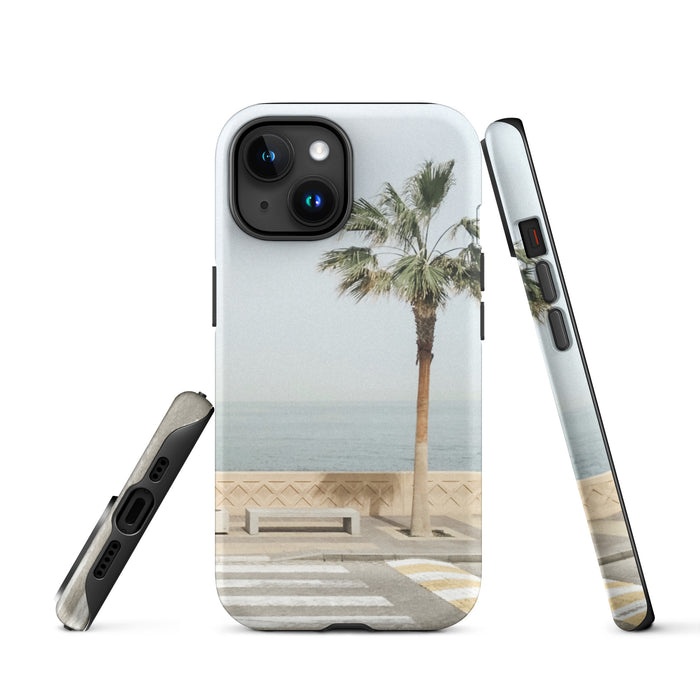 Phone case with a palm tree and beach design on a white background