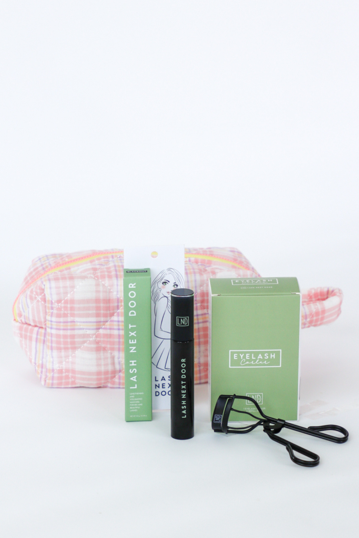 Eyelash extensions kit with tools and packaging on a white background