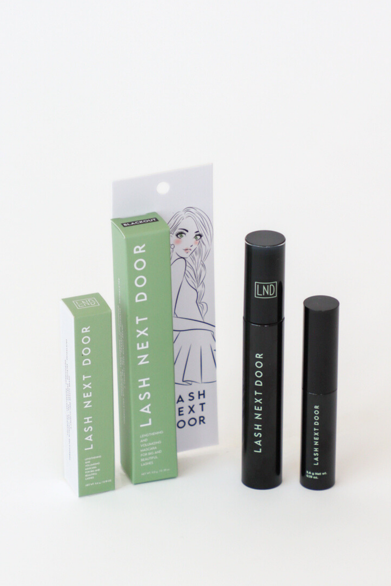 Lash Next Door product packaging and mascara on a white background