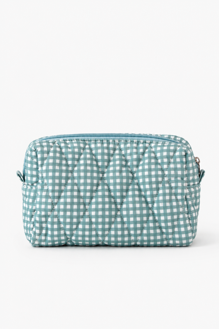 A quilted cosmetic pouch with a light blue and white gingham pattern, shown against a plain white background.