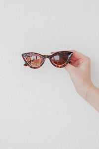 brown tortoise cat-eye sunglasses