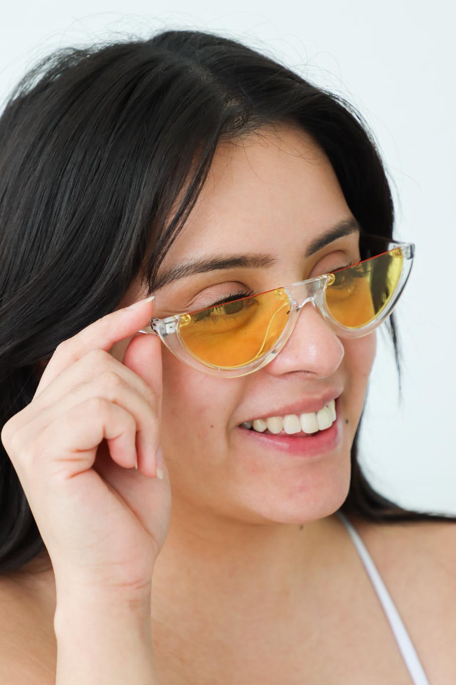 girl wearing yellow acrylic sunglasses