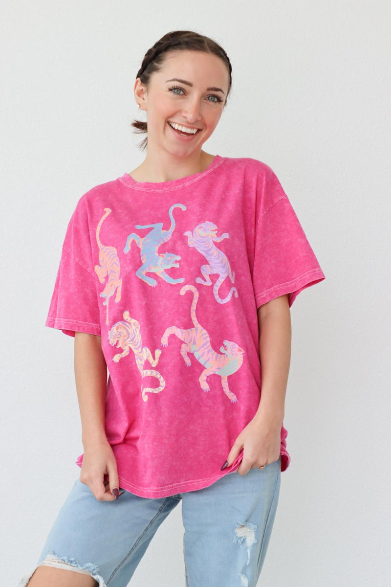 girl wearing pink tiger graphic t-shirt