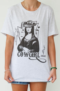 girl wearing gray mona lisa cowgirl graphic t-shirt
