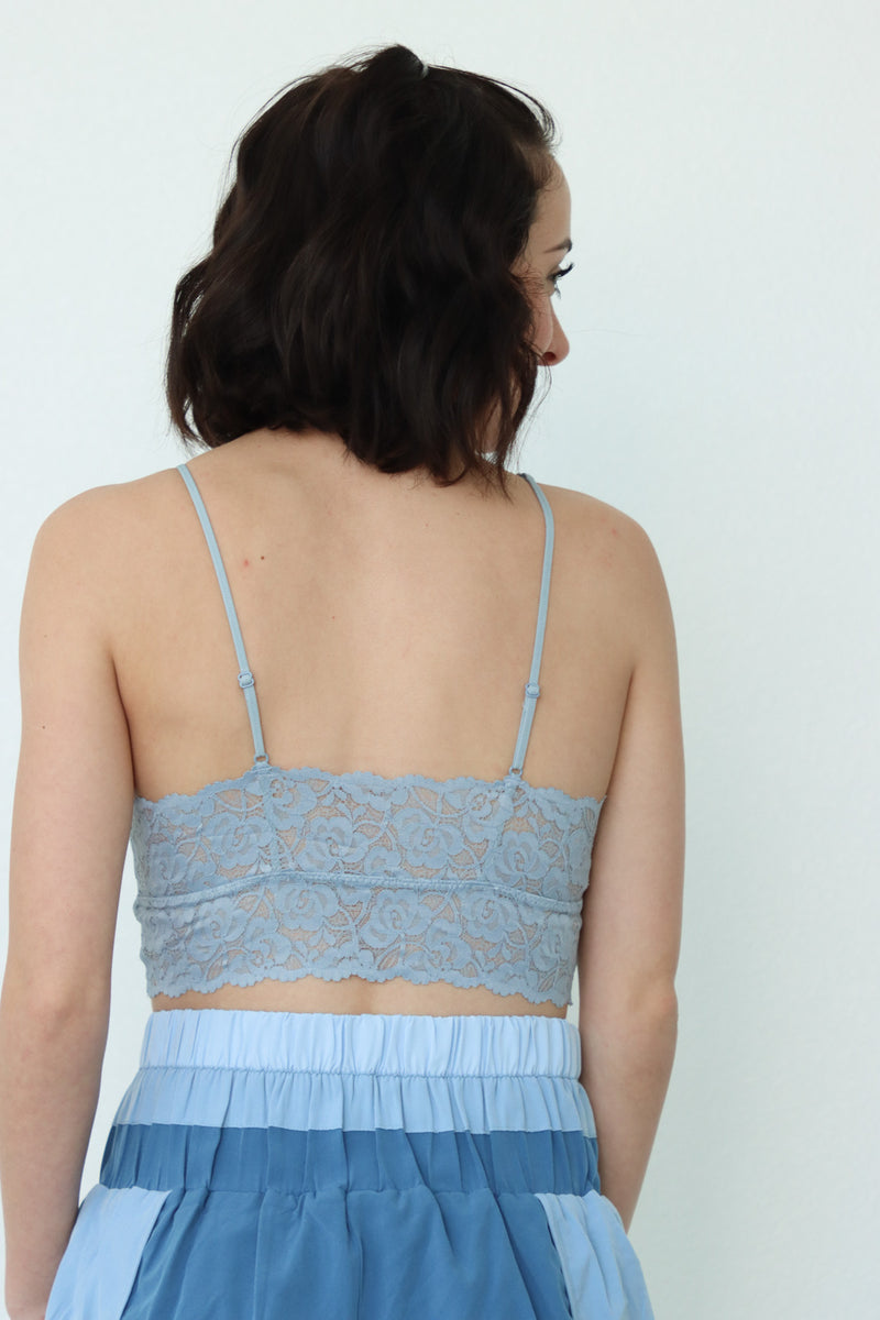 lace detailing on the back of the light blue bralette