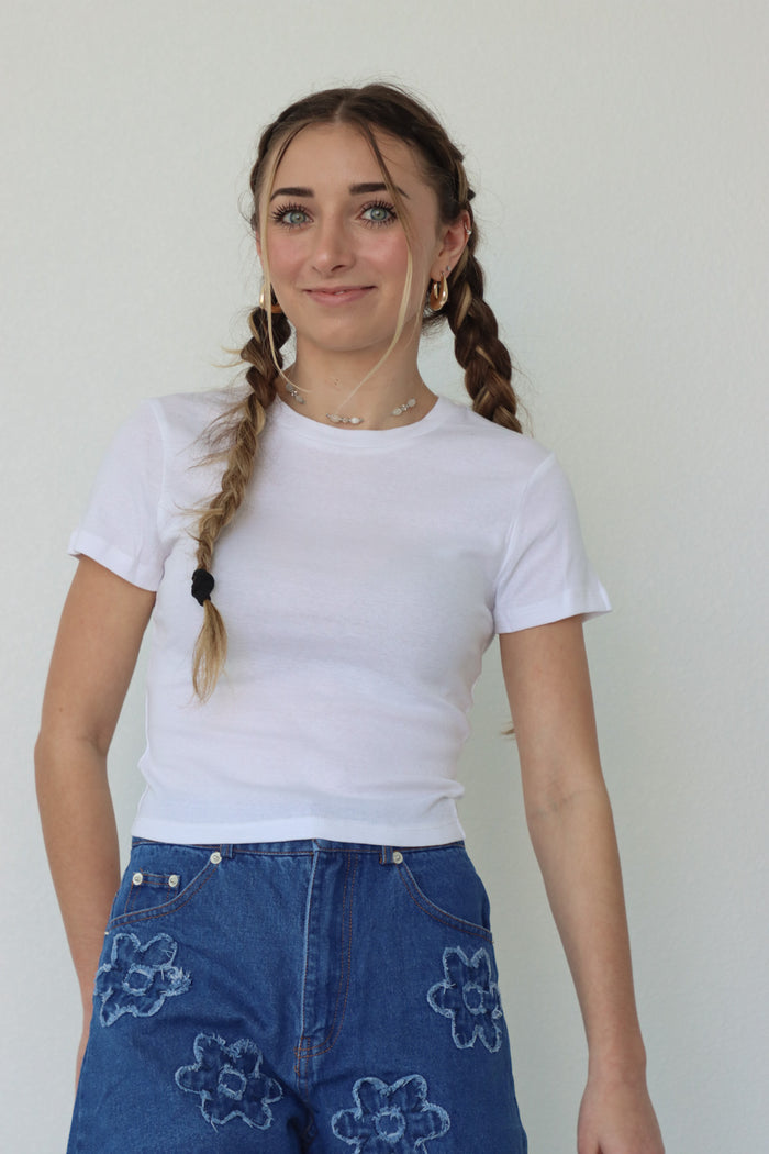 girl wearing basic white t-shirt