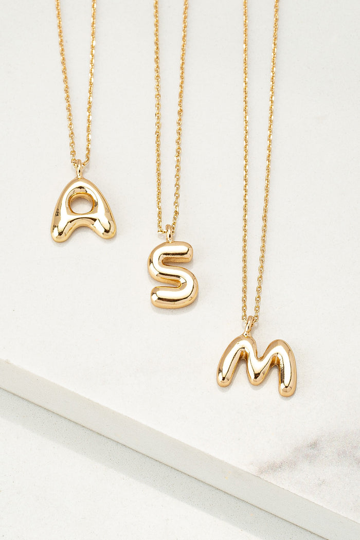 gold "A" "S" and "M" initial necklaces
