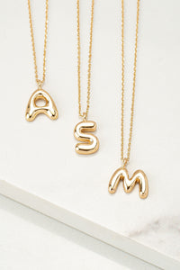 gold "A" "S" and "M" initial necklaces
