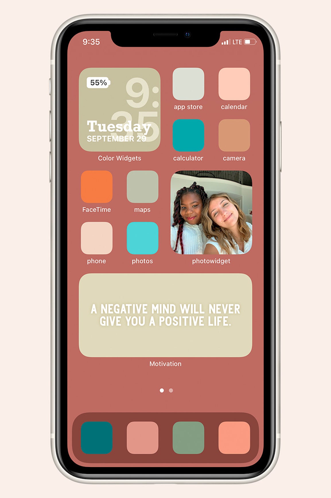 red-ish background with colored bright and pastel toned squares as the app icons