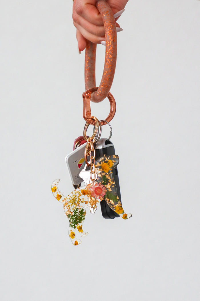 Resin dog keychain with flowers