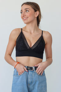 Girl wearing a lacey triangle bralette