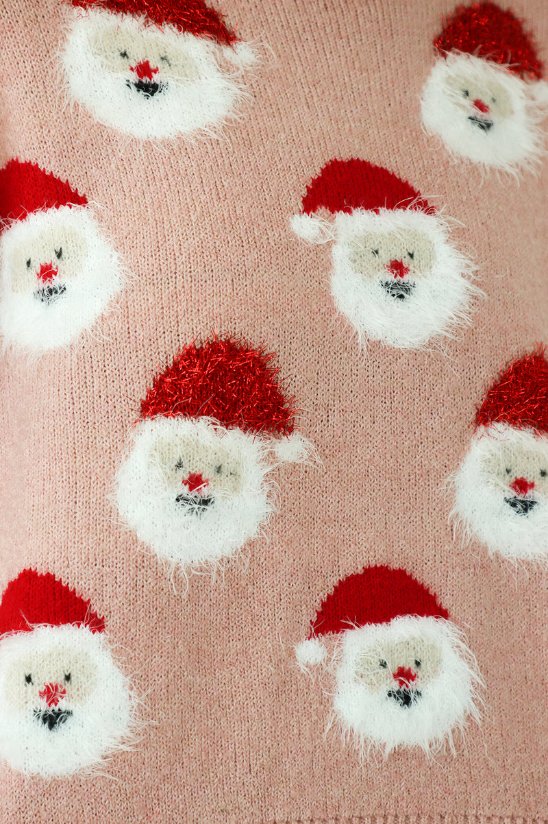 close up of fuzzy santas all over the sweater