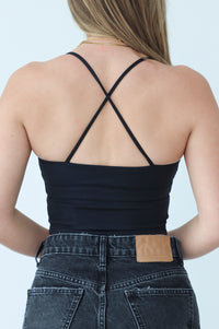 back of black athletic tank with criss cross straps and full back tank