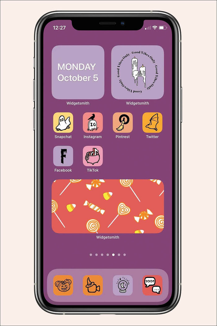 halloween inspired ios icon pack with purple background and spooky themed apps and widgets