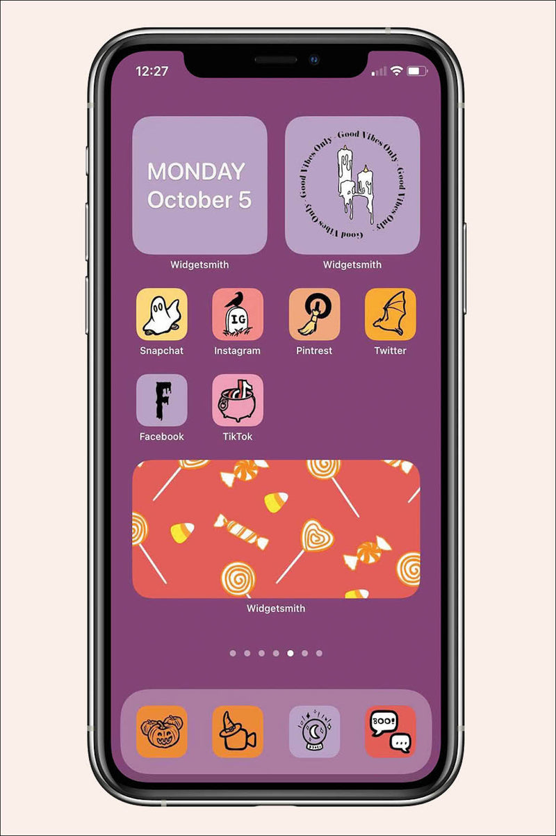 halloween inspired ios icon pack with purple background and spooky themed apps and widgets