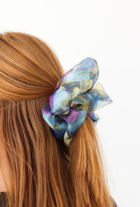 blue scrunchie in hair