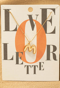M letter gold necklace