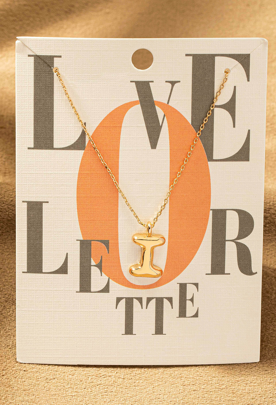 I letter gold necklace