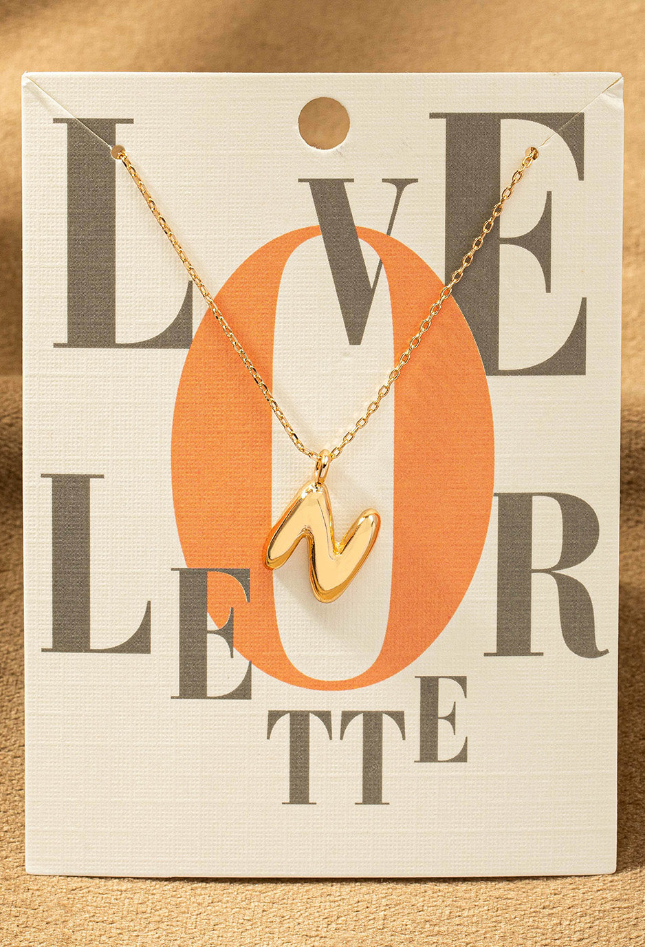 N letter gold necklace