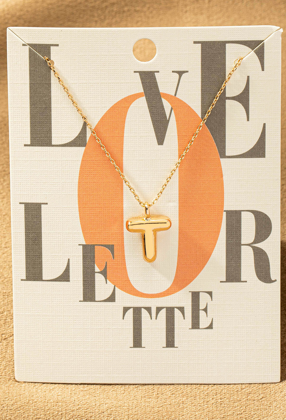 T letter gold necklace
