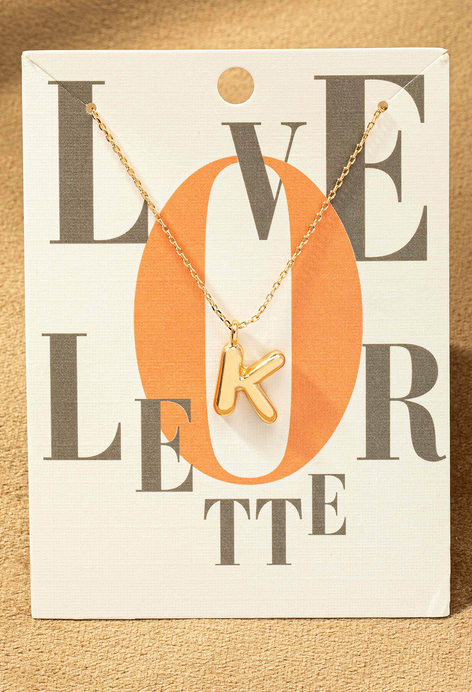K letter gold necklace